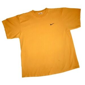 Yellow vintage Nike tee with stitched swoosh